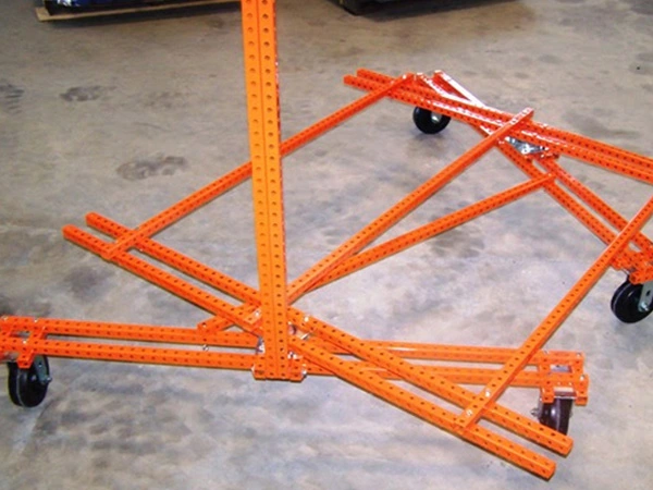 An orange zero-turn Flex Craft Quad Cart.