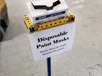 Custom Point-Of-Use Disposable Mask Station for personal protection equipment made with Flex Craft 1"x1" steel tubing.